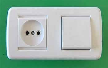 Stikkontakt med en kontakt i et hus: hvordan man forbinder en stikkontakt med en kontakt
