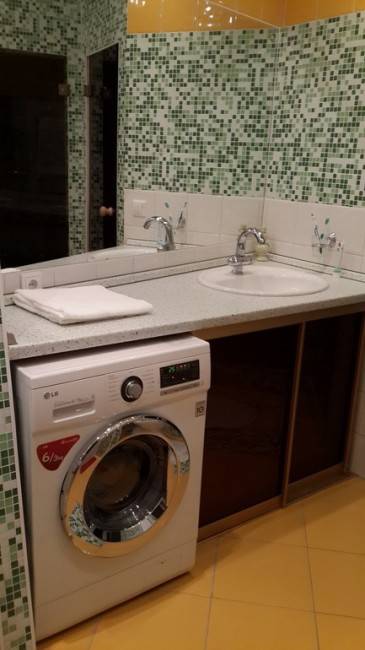 Waschbecken über der Waschmaschine: Designmerkmale + Installationsnuancen