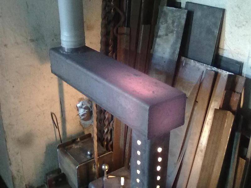 So installieren Sie einen Dickbauchofen in einem Landhaus mit Ihren eigenen Händen: Regeln und Empfehlungen