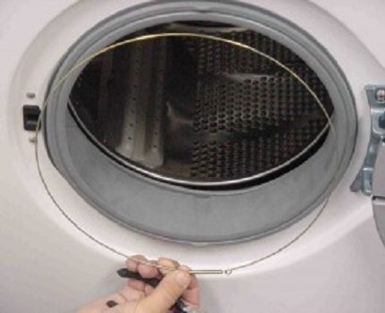 Vaskemaskinemanchet: formål, instruktion om udskiftning og reparation