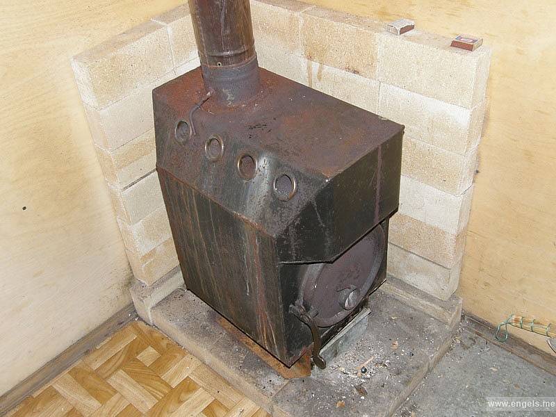 Garagenofen zum Selbermachen - Merkmale, Grundvoraussetzungen, Typen und Materialien für die Herstellung. 100 Fotos von Öfen aus Rohren, Felgen