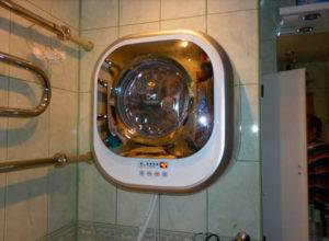 Vægmonteret vaskemaskine: fordele og ulemper ved en vægmonteret løsning + vurdering af de bedste modeller