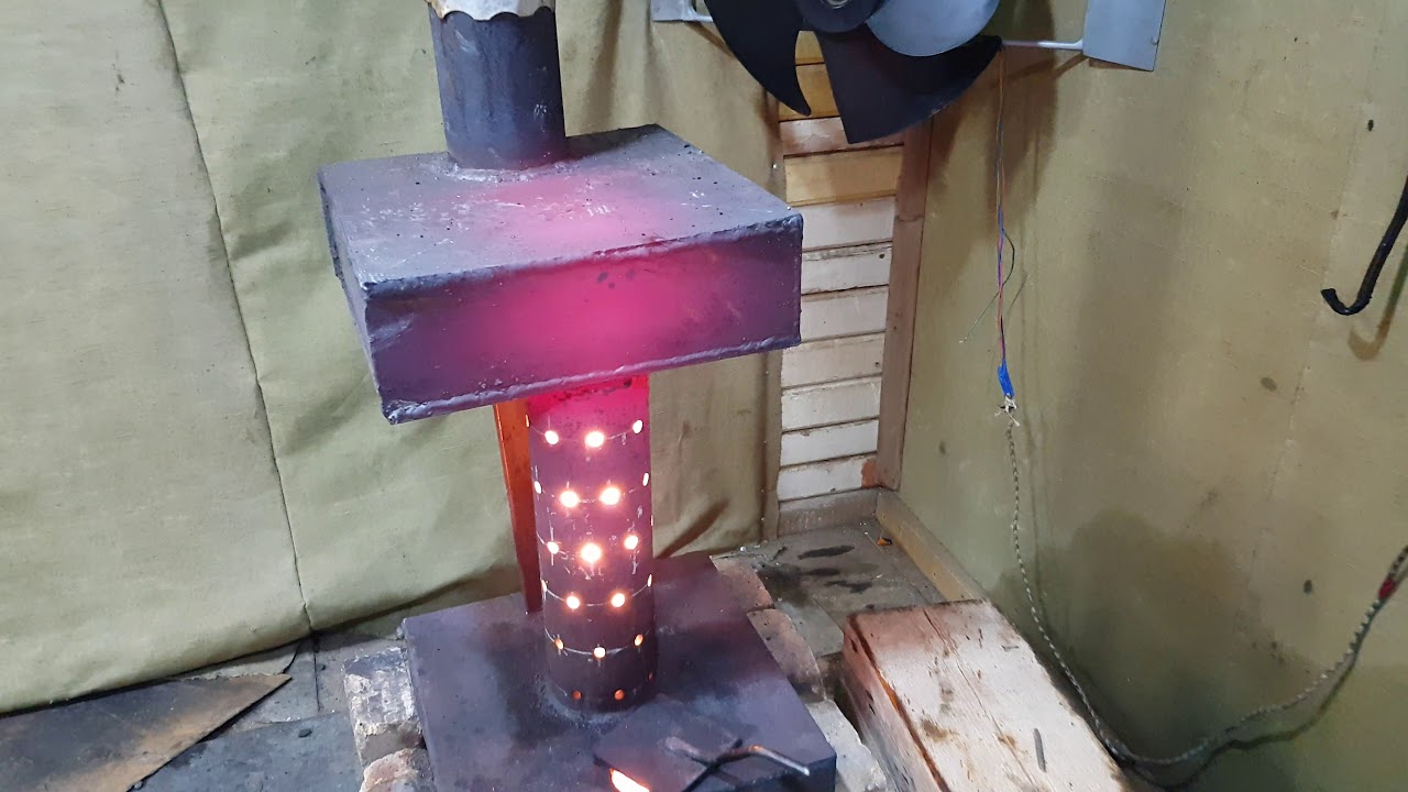 Do-it-yourself-Ofen zum Trainieren für eine Garage: Wie man einen hausgemachten Ofen in einer Garage herstellt