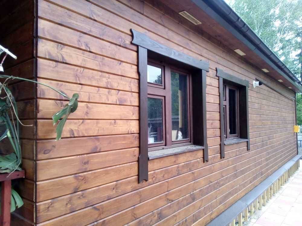 Wie kann man ein Haus von einer Bar draußen umhüllen? 41 Fotooptionen für Außenverkleidungen und Außenverkleidungen mit neuen Technologien, wenn es möglich ist, eine Holzkonstruktion aus geklebtem Material zu veredeln