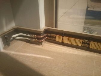 Baseboard opvarmning: funktioner ved installation af en vand og elektrisk varm baseboard