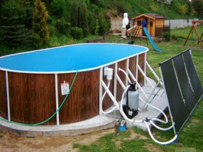 Für Schwimmer auch bei Kälte: ein holzbefeuerter Poolofen. wie selber bauen?
