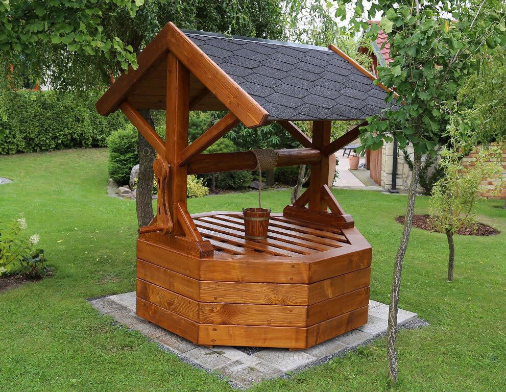 Mit eigenen Händen einen Brunnen im Land machen: wie man veredelt und schön ausrüstet