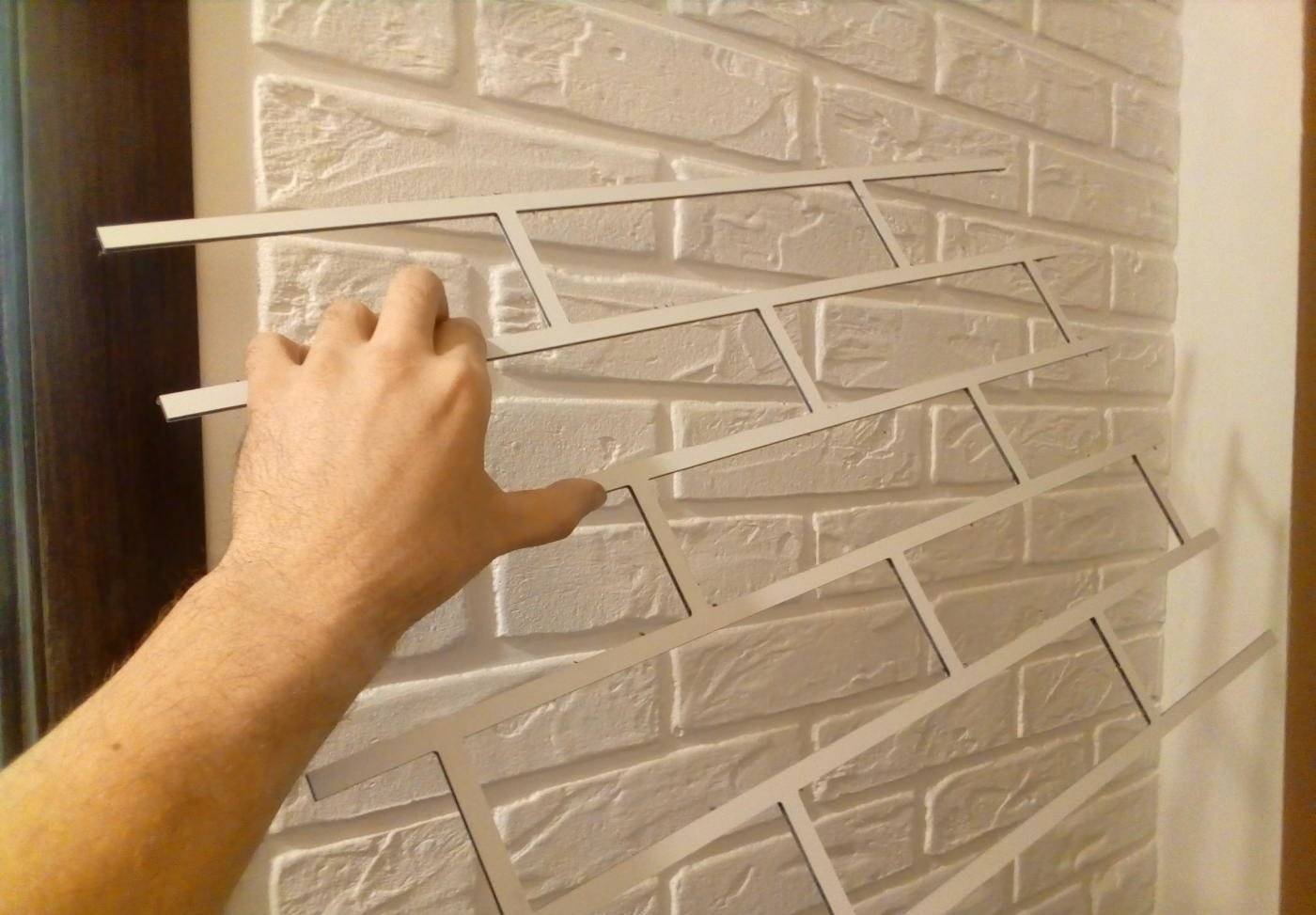 10 Möglichkeiten, eine schöne Imitation von Mauerwerk an der Wand zu machen